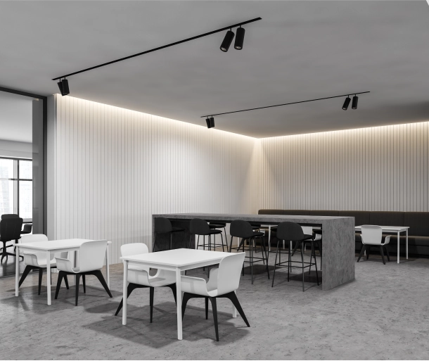 Grey-toned office space with custom, professionally installed lighting fixtures.