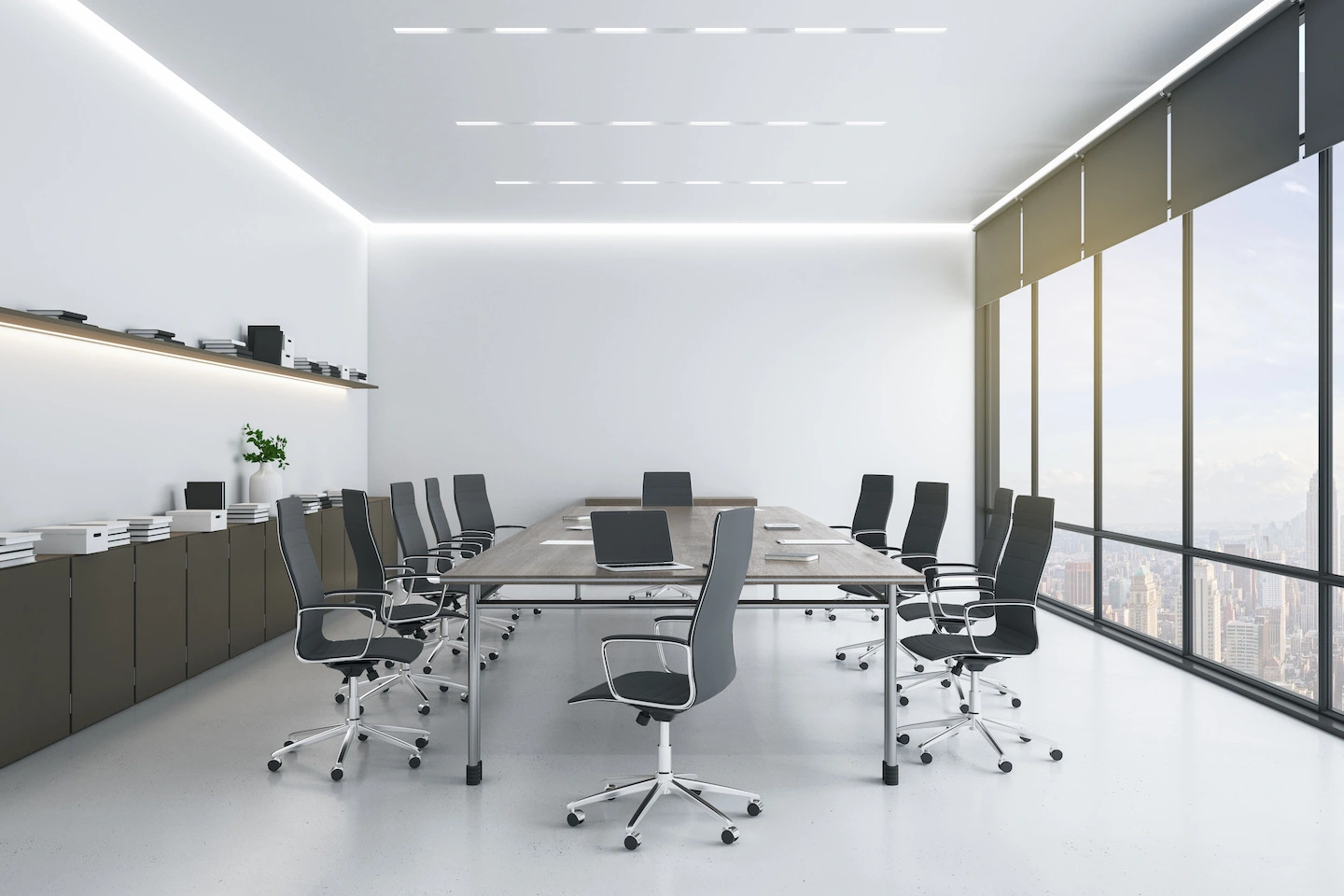 Commercial office meeting room with LED lighting along the corners of the walls.