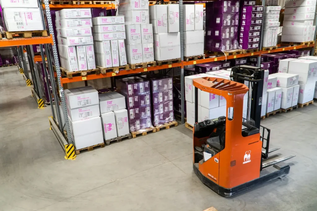 Pallet jack truck inside warehouse in Austin, Texas.